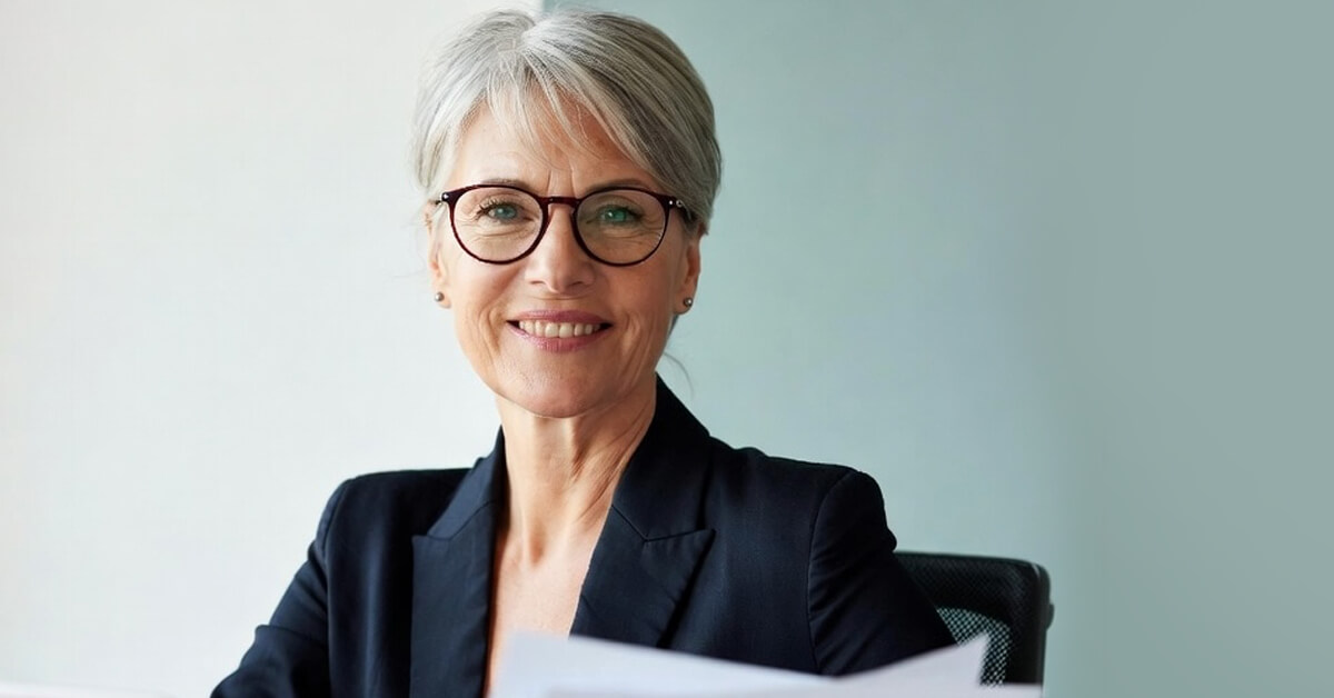 an older business woman smiling