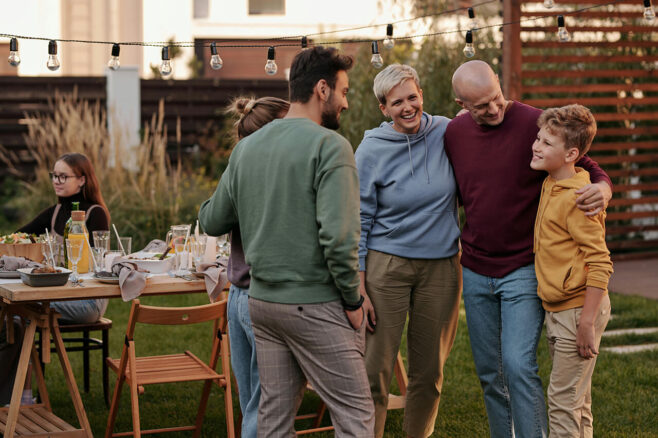 family get together outdoors in the back yard