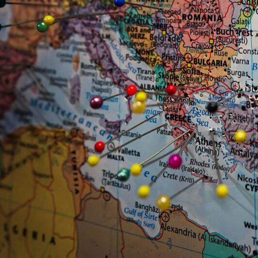 travel pins in a map of Europe