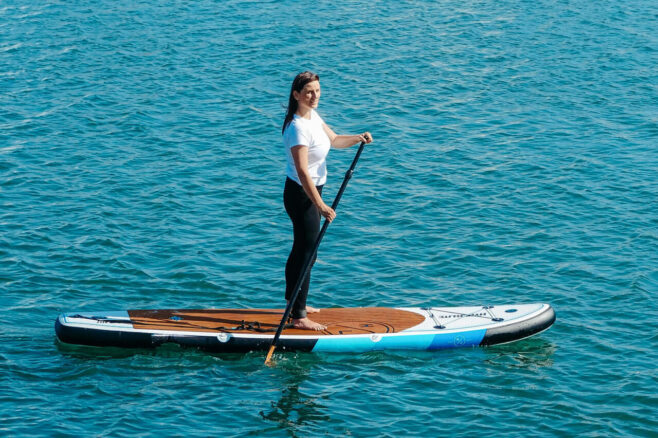 woman paddleboarding